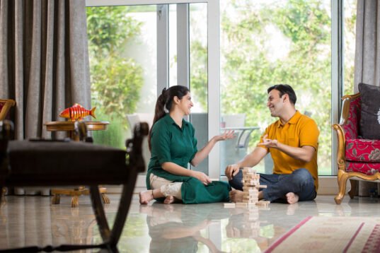 Happy,Couple,Playing,Wooden,Building,Blocks,At,Home Happy,Couple,Playing,Wooden,Building,Blocks,At,Home