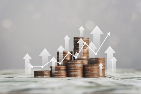 Stack,Of,Silver,Coins,With,Trading,Chart,In,Financial,Concepts Stack,Of,Silver,Coins,With,Trading,Chart,In,Financial,Concepts